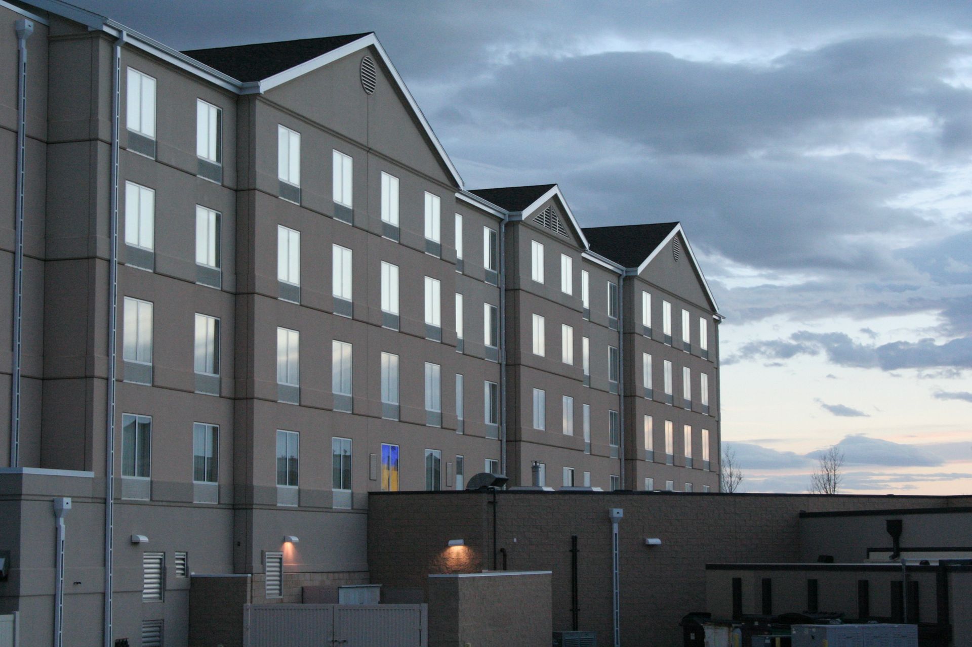 Apartment building exterior at sunset